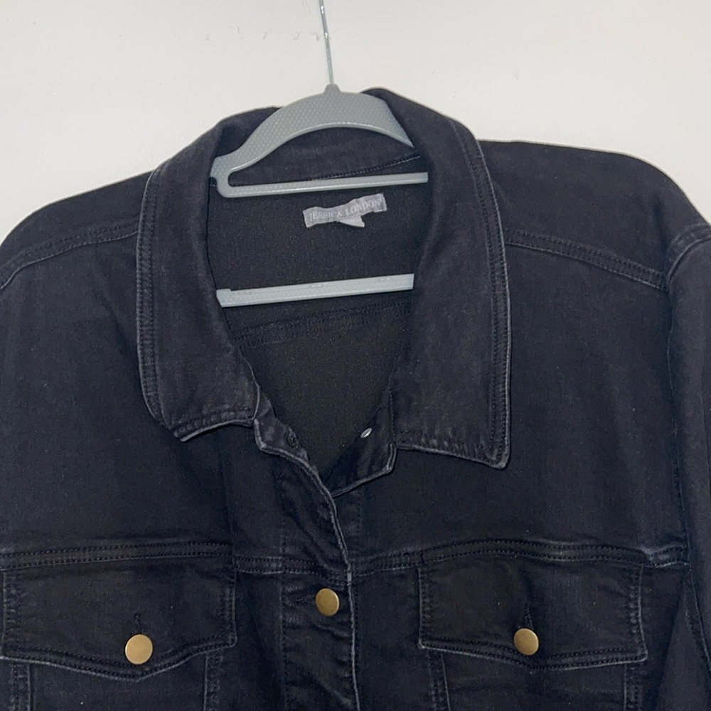 Black button down denim jacket.